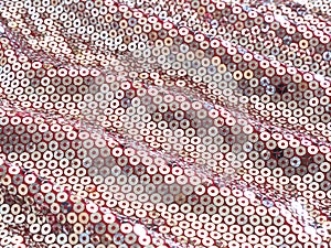 Abstract background glowing in the sun wavy pink fabric with silver sequins.