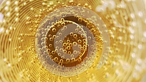 Abstract background of golden liquid in a glass full of air bubbles