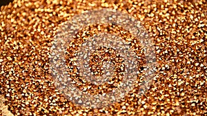 Abstract background of golden rhinestones spinning