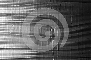 Abstract background: Graphite gray wavy texture. Decorative wall decoration