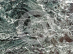 abstract background of green marble with veins