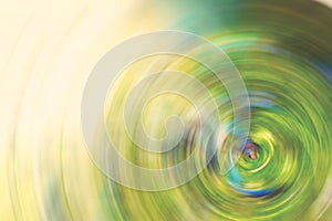 Abstract Background of green tone spin circle radial motion blur