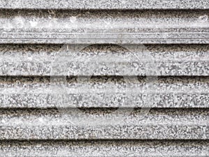 An abstract background image of a horizontal section of unpainted galvanised steel photo