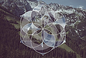 Geometric collage with the mountains and sacred geometry photo