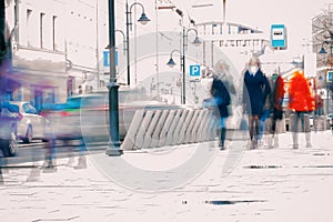 Abstract background. Intentional motion blur. City in the early spring. Street, girl walking on the sidewalk, concept of