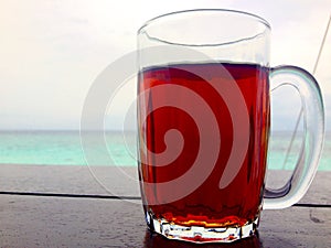 Abstract background isolated glass mug refreshing black tea tropical island holiday