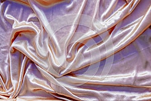 Abstract background luxury cloth or liquid wave or wavy folds of gold silk texture satin velvet material
