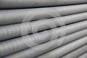 Abstract background of metallic long pipes with thread