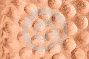Abstract background, metallic peach fuzz color, volumetric bubbles futuristic pattern