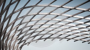 Abstract background. Modern geometric futuristic architecture in the city in an urban environment. Curves in the details