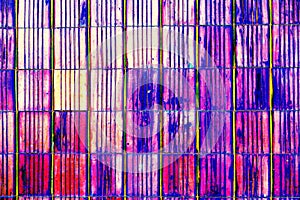 abstract background of multi-colored stripes on ceramic tiles on the wall, abstract pattern, changed colors.