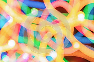Abstract background of multicolored bokeh lights defocused