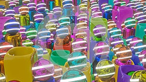 Abstract background of multicolored cylinders with spheres sticking out of cubes and with holes. 3d render illustration