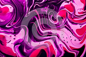 Abstract background of multicolored liquid paint swirls