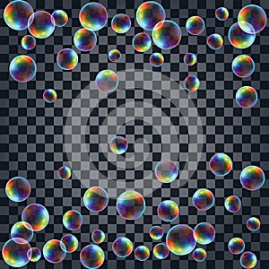 Abstract background with the multicolored realistic soap bubbles