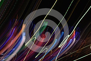 Abstract background of night light on street. Multicolored striped lines in motion made from  lighting effect ,Light trails over