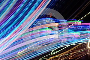 Abstract background of night light on street. Multicolored striped lines in motion made from  lighting effect ,Light trails over