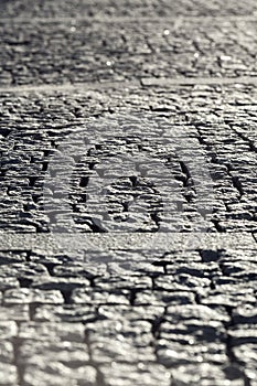 Abstract Background of Old Cobblestone Pavement Road