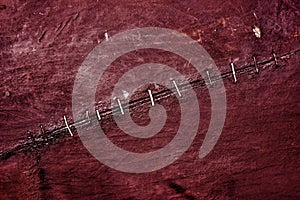 Abstract background of old tarred wooden planks of the old boat