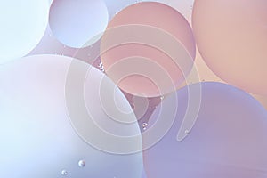 Abstract background with pastel colors with oil circles water surface.