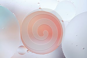 Abstract background with pastel colors with oil circles water surface.