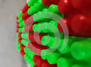 Abstract background pattern of colored building blocks. Pattern of plastic part of constructor block puzzle