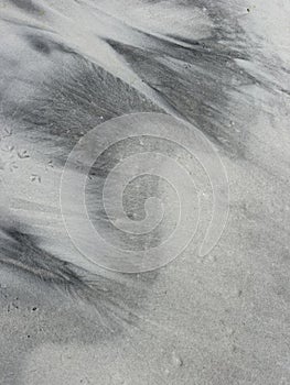 Abstract background of patterns on beach sand
