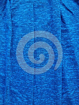 Abstract background photo of a blue t-shirt with a little white color combination