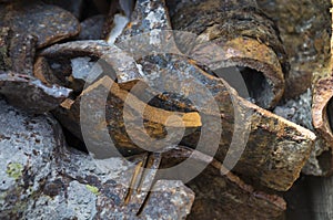 Abstract background with pieces of old rusting cast iron