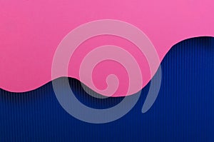 Modern colored background. Pink and dark blue textured paper.Empty space for design photo