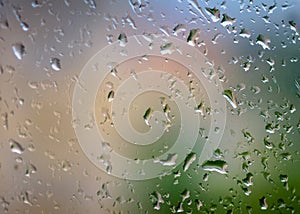 Abstract background with raindrops on glass.