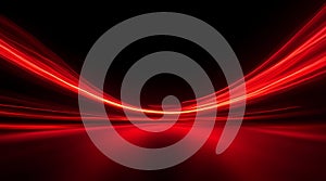 Abstract background with red light trails on a dark surface creating a dynamic and modern effect
