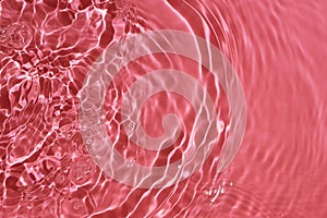 Abstract background of rippling pink water