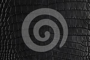 Abstract background of seamless crocodile black leather texture