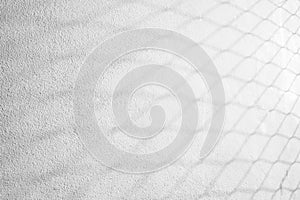 Abstract background of shadow Mesh on concrete rough texture wall. White and Black.