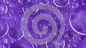 Abstract background shiny fluid mix violet glitter