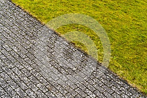 Abstract background with sidewalk and green grass