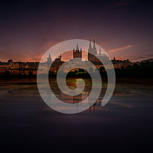 Abstract background with silhouette of cologne and sunset