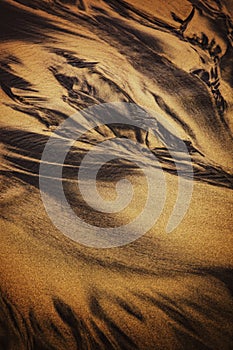Abstract background with texture and pattern of sand with streaks and veins