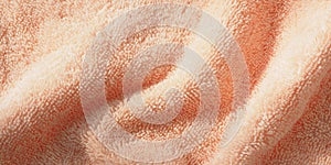 Abstract background and texture of a pink terry cloth with folds. Bright sunshine and shadows. Banner