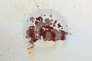 Abstract background and texture of rust on an old aged iron coating surface with white color.