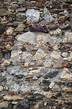 Abstract background, textured surface of an ancient wall.