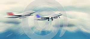 Abstract background. Two passenger jets flying above the clouds.