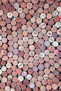 Abstract background of used red wine corks and white wine corks