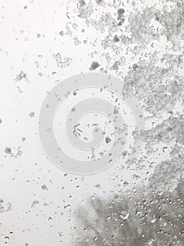 Abstract background View from Car Wet window Winter time