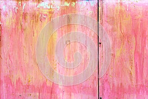 Abstract background. A wall with pink and yellow spots and stains.