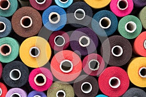 Colored sewing threads as background and wallpaper
