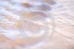 Abstract background of water ripples. shallow depth of field.