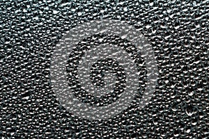 Abstract background of wet steam or water droplets on aluminum