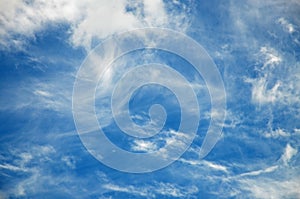 Abstract background white cirrus clouds against a blue sky